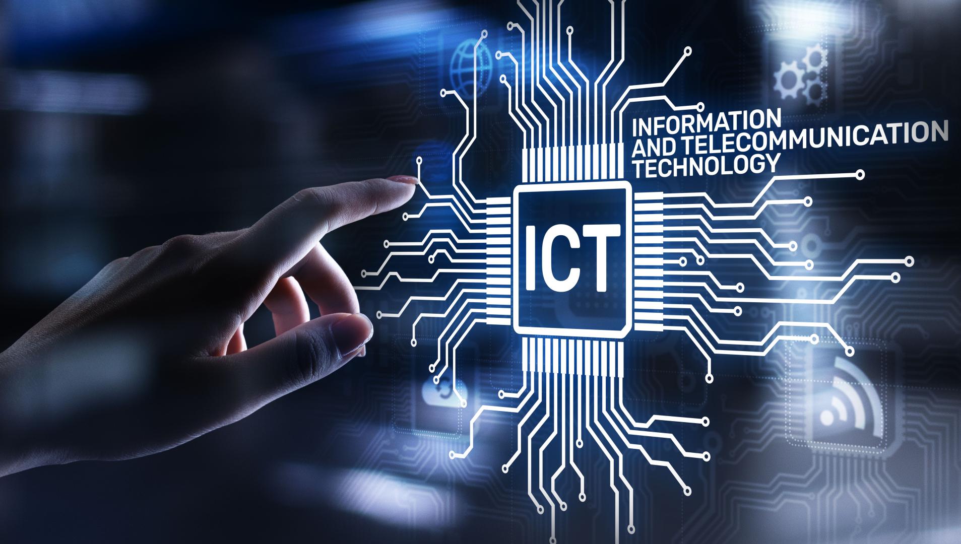 Hand pointing on a chip with ICT inscription